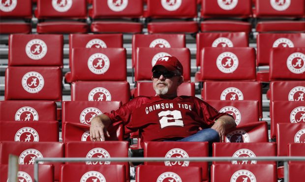 An Alabama Crimson Tide fan arrives early before the game against the Southern Mississippi Golden E...
