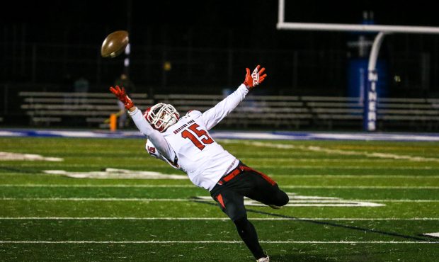 American Fork's Devin Downing (15) misses catching the ball during the game against Bingham at Bing...
