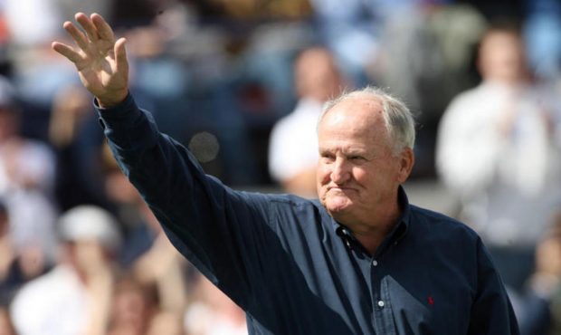 Former BYU football coach LaVell Edwards acknowledges the crowd as he and other BYU Hall of Fame In...