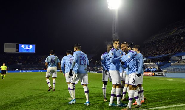 Gabriel Jesus of Manchester City celebrates with his team mates after scoring his team's second goa...