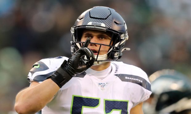 Cody Barton #57 of the Seattle Seahawks motions to the crowd during the second half against the Phi...