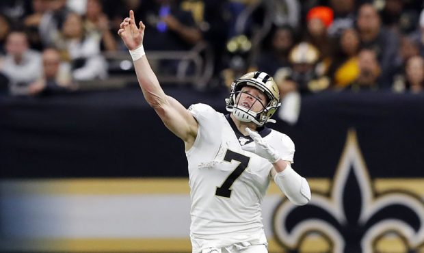 Taysom Hill #7 of the New Orleans Saints throws a pass during the first half against the Minnesota ...