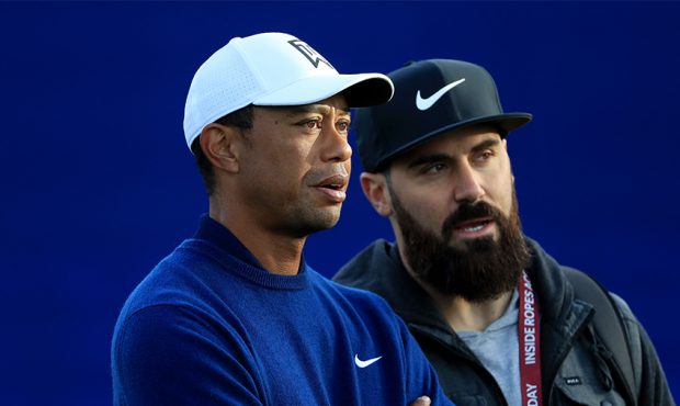 SAN DIEGO, CALIFORNIA - Tiger Woods shares a laugh with NFL player Eric Weddle during the Pro-Am fo...