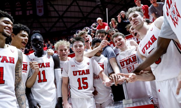 The Utah Utes celebrate their win over the Washington State Cougars at the Huntsman Center in Salt ...