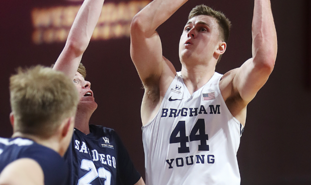 Brigham Young Cougars guard Connor Harding (44) goes up for a shot with San Diego Toreros guard Fin...