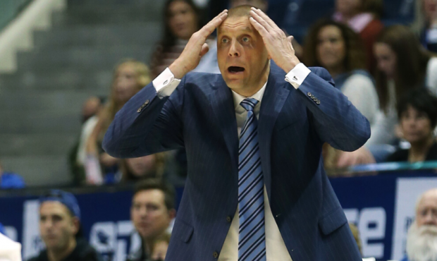 Brigham Young Cougars head coach Mark Pope calls out instructions as BYU and Cal State Fullerton pl...