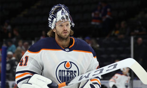 Mike Smith #41 of the Edmonton Oilers skates in warm-ups prior to the game against the New York Isl...