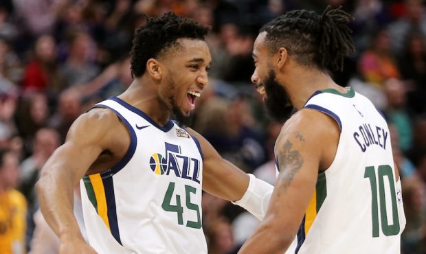 Utah Jazz guard Donovan Mitchell (45) and Utah Jazz guard Mike Conley (10) celebrate after a Conley...