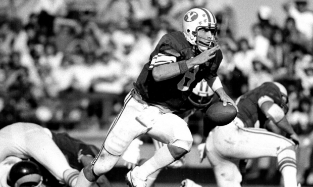 OCT 24 1982; Steve Young, the descendant of Brigham Young who quarterbacks BYU, scrambles upfield d...