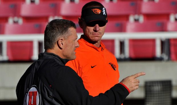 Head coach Kyle Whittingham of the Utah Utes and head coach Gary Andersen of the Oregon State Beave...