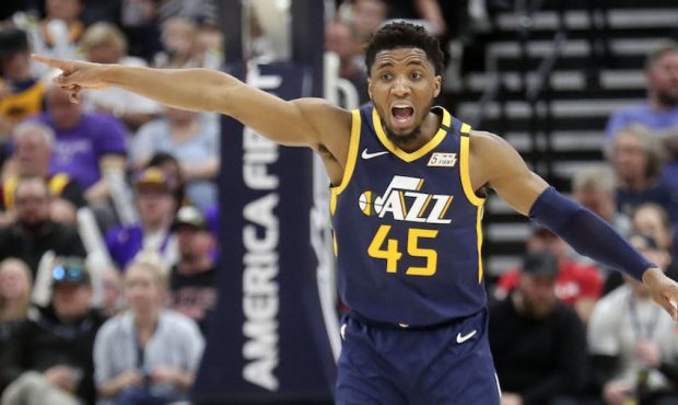 Utah Jazz guard Donovan Mitchell (45) yells to his teammates during an NBA game against the Phoenix...