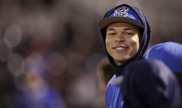 Jaren Hall smiles in BYU dugout of March 8th, 2019 game against Utah Valley University. (BYU Photo/...