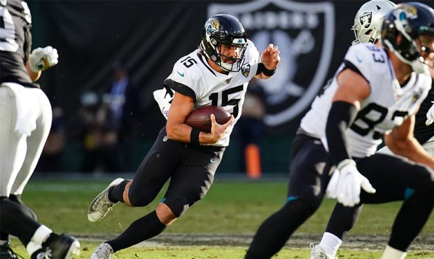Gardner Minshew II #15 of the Jacksonville Jaguars runs the ball during the second half against the...