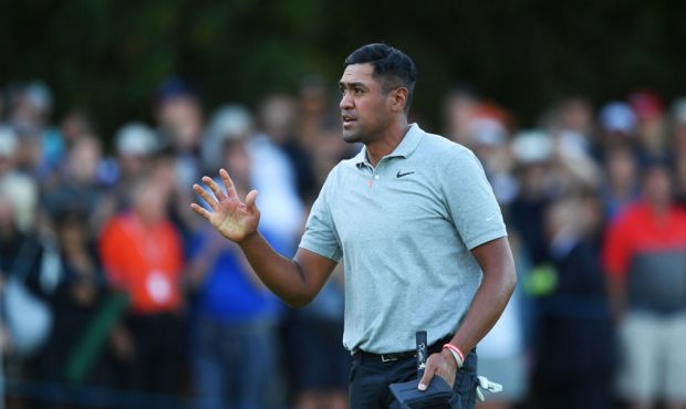 Tony Finau of the United States acknowledges the crowd on the 18th green during Day One of the BMW ...