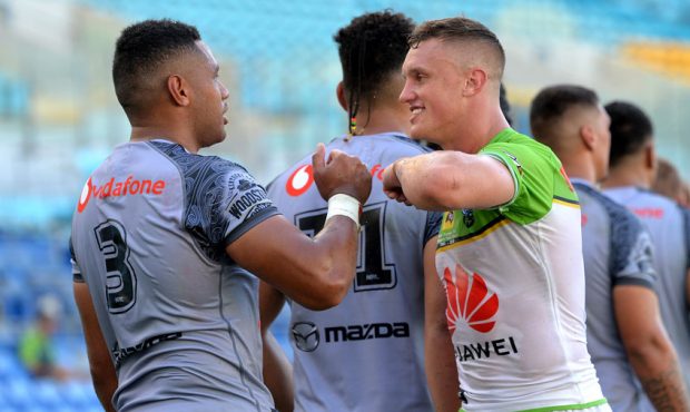 Jack Wighton of the Raiders and David Fusitu'a of the Warriors give each other elbow taps instead o...
