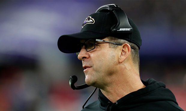 Head coach John Harbaugh of the Baltimore Ravens looks on from the sidelines during the AFC Divisio...
