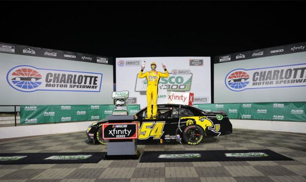 Kyle Busch, driver of the #54 App State Class of 2020 Toyota, celebrates in Victory Lane after winn...