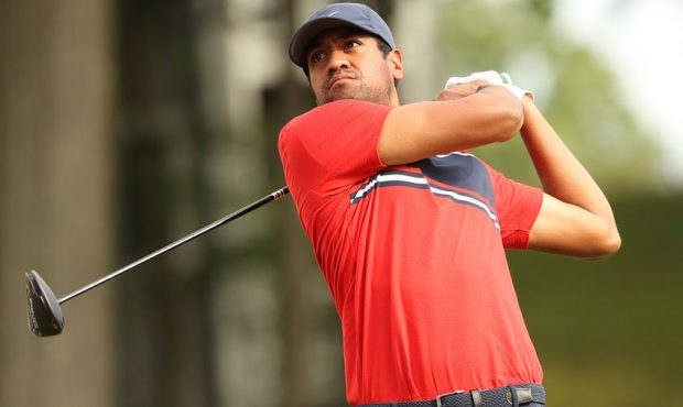 Tony Finau of the United States plays his shot from the 18th tee during the first round of the Trav...