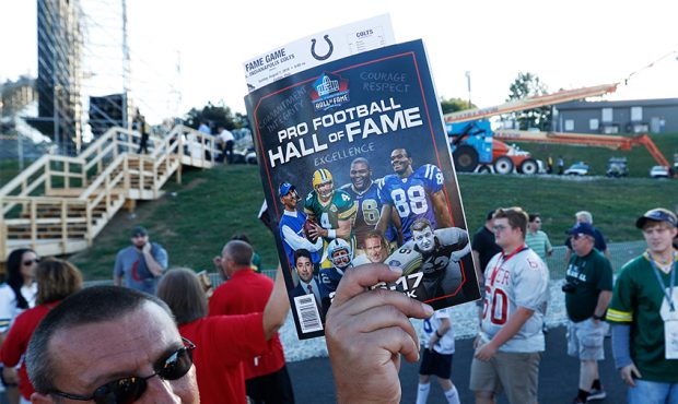 CANTON, OH - AUGUST 07: A vendor sells programs as fans of the Green Bay Packers and Indianapolis C...