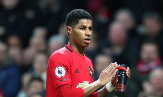MANCHESTER, ENGLAND - JANUARY 11: Marcus Rashford of Manchester United is substituted during the Pr...