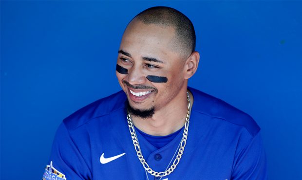 GLENDALE, ARIZONA - FEBRUARY 24: Mookie Betts #50 of the Los Angeles Dodgers looks on from the dugo...