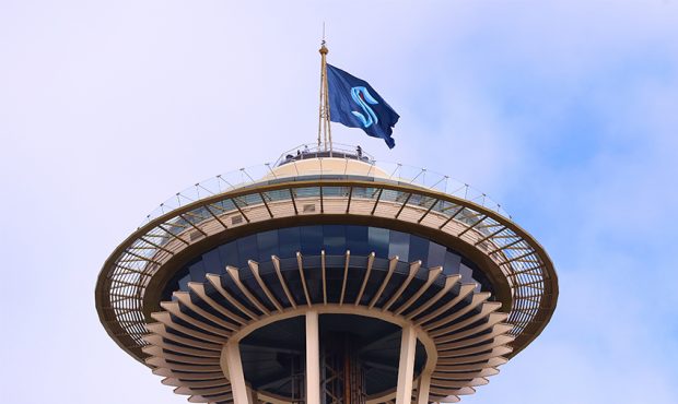 SEATTLE, WASHINGTON - JULY 23: A general view of the Space Needle as the Seattle Kraken team flag i...