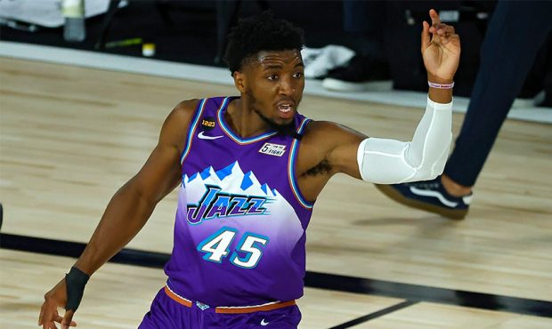 Donovan Mitchell #45 of the Utah Jazz reacts after scoring a basket against the Memphis Grizzlies d...