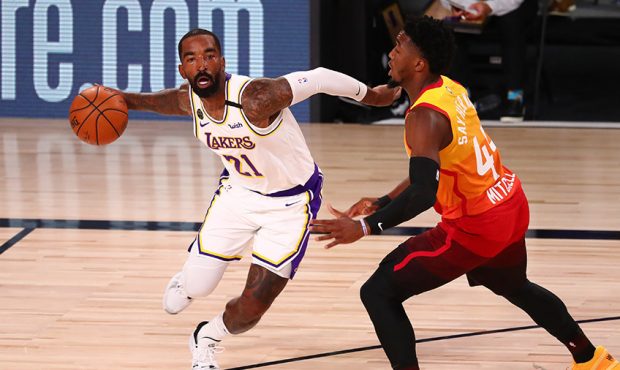 J.R. Smith #21 of the Los Angeles Lakers drives against Donovan Mitchell #45 of the Utah Jazz durin...