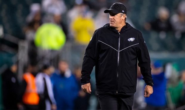 Head coach Doug Pederson of the Philadelphia Eagles watches warm ups before the game against the Ne...