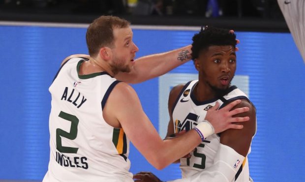Donovan Mitchell and Joe Ingles (Photo by Kim Klement-Pool/Getty Images)...