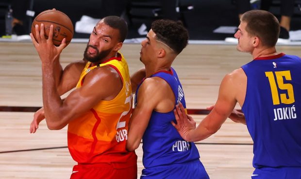 Rudy Gobert, Michael Porter Jr., and Nikola Jokic (Photo by Kevin C. Cox/Getty Images)...