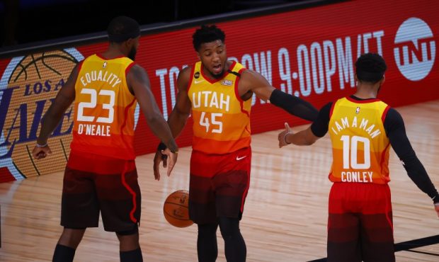 Royce O'Neale, Donovan Mitchell, and Mike Conley of the Utah Jazz (Photo by Kevin C. Cox/Getty Imag...