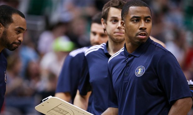 Utah Jazz assistant coach Johnnie Bryant, right, talks with the coaching staff during a Utah Jazz s...