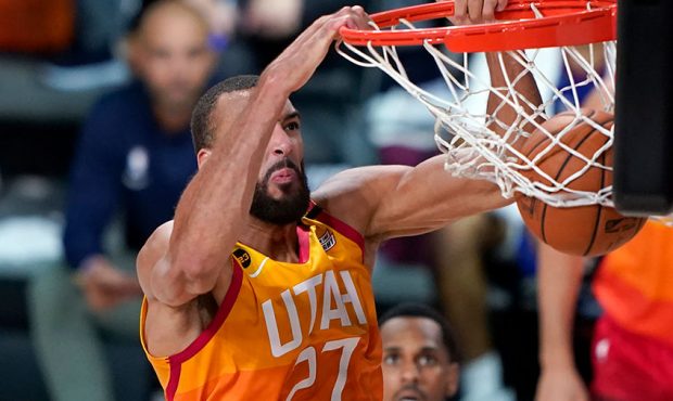 Rudy Gobert #27 of the Utah Jazz dunks the ball against the Denver Nuggets during the second half o...