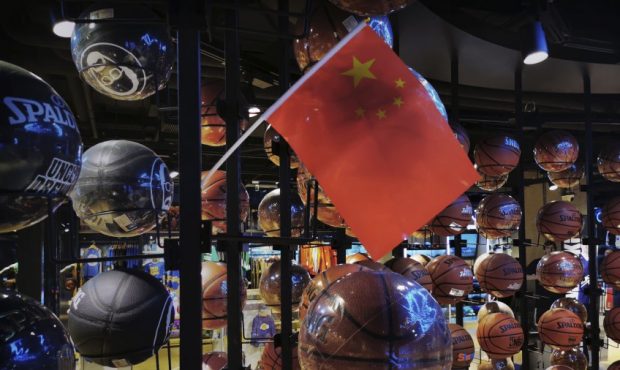 Chinese Flag hangs in NBA store in Beijing. (Photo by Kevin Frayer/Getty Images)...