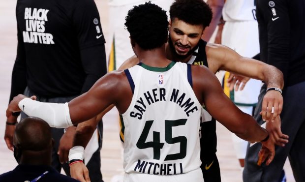 Donovan Mitchell of the Utah Jazz wears Say Her Name on the back of his jersey. (Photo by Mike Ehrm...