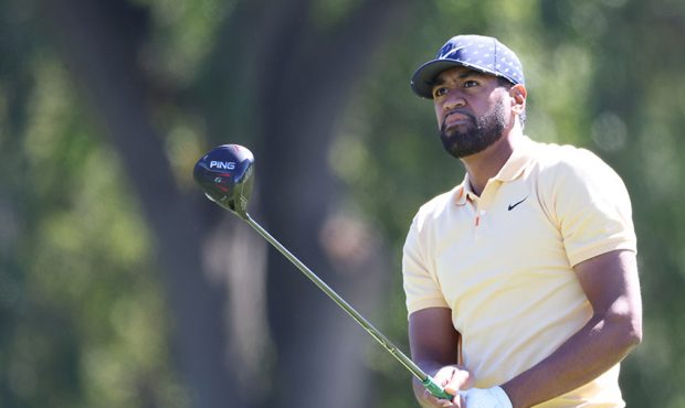 Tony Finau of the United States plays his shot from the second tee during the third round of the 12...