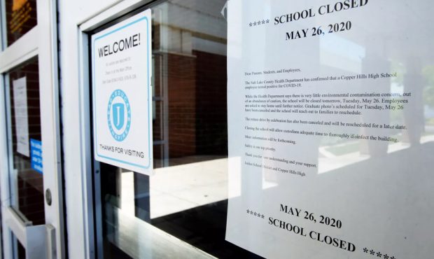 A sign on a door at Copper Hills High School in West Jordan states on Tuesday, May 26, 2020, that t...