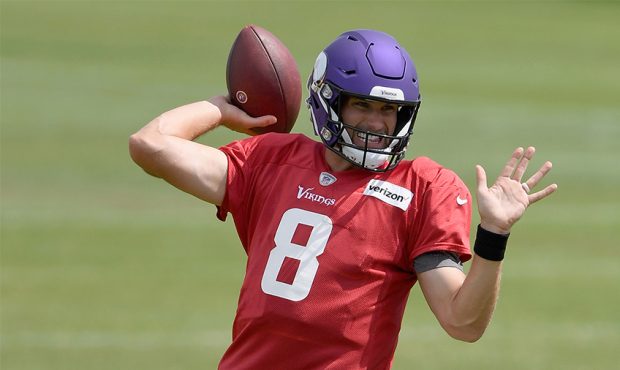 EAGAN, MINNESOTA - AUGUST 19: Quarterback Kirk Cousins #8 of the Minnesota Vikings passes the ball ...