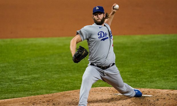 Clayton Kershaw #22 of the Los Angeles Dodgers pitches during Game 5 of the 2020 World Series betwe...