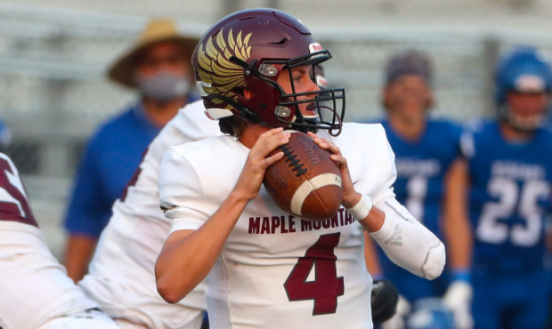 Action in the Maple Mountain at Pleasant Grove football game in Pleasant Grove on Friday, Aug. 21, ...