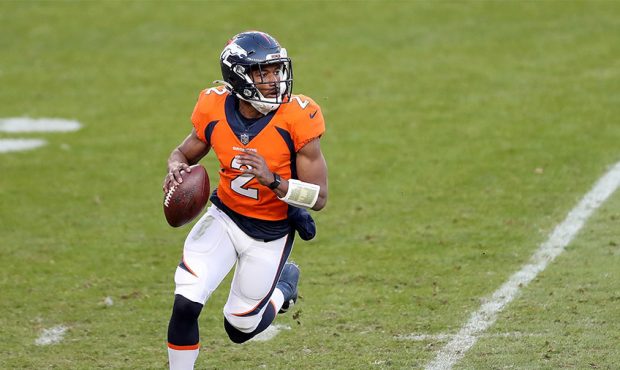 Kendall Hinton #2 of the Denver Broncos looks to pass during the third quarter of a game against th...