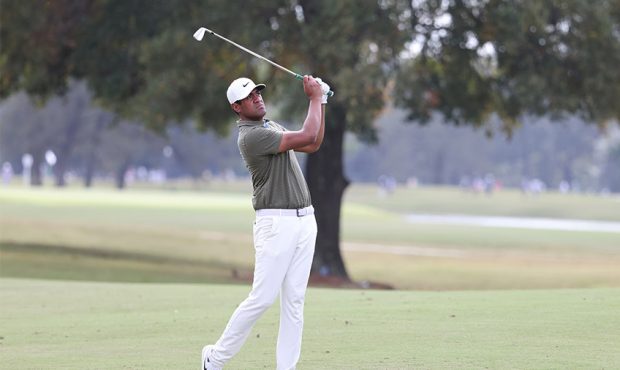 Tony Finau of the United States plays a shot on the 12th hole during the final round of the Houston...