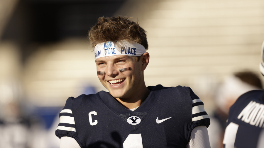 BYU quarterback Zach Wilson holds a New York Jets jersey on stage after  being selected second overall in the first round of the NFL football draft,  Thursday, April 29, 2021, in Cleveland. (