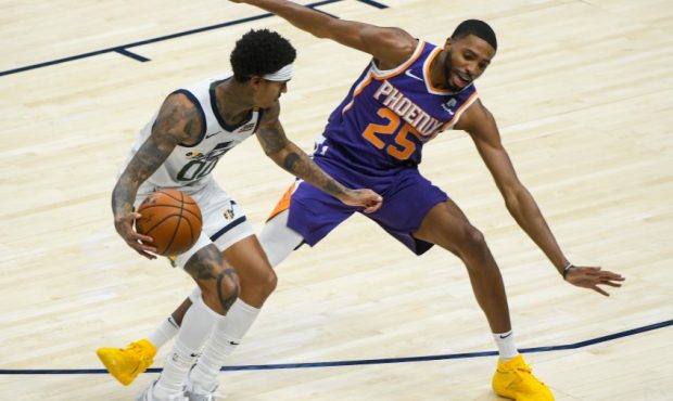 Phoenix Suns wing Mikal Bridges defends Utah Jazz guard Jordan Clarkson (Photo by Alex Goodlett/Get...