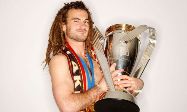 Kyle Beckerman #5 of Real Salt Lake poses with the Philip F. Anschutz MLS Cup trophy following thei...