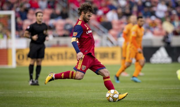 Kyle Beckerman plays a long ball across the pitch on October 1st, 2019 against Houston Dynamo. Phot...
