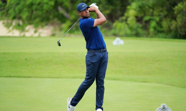 Tony Finau of the United States plays his shot from the second tee during the second round of the M...