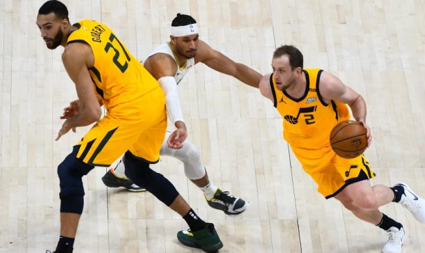 Rudy Gobert sets a screen for Joe Ingles as the Utah Jazz face the New Orleans Pelicans (Photo by A...