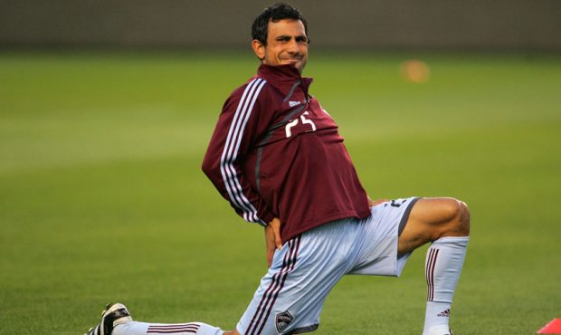 Pablo Mastroeni #25 of Colorado Rapids stretches prior to their MLS match against Chivas USA at the...
